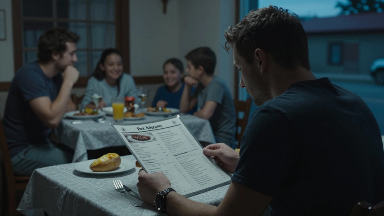 Person alone at a restaurant with limited food options while others eat together nearby.