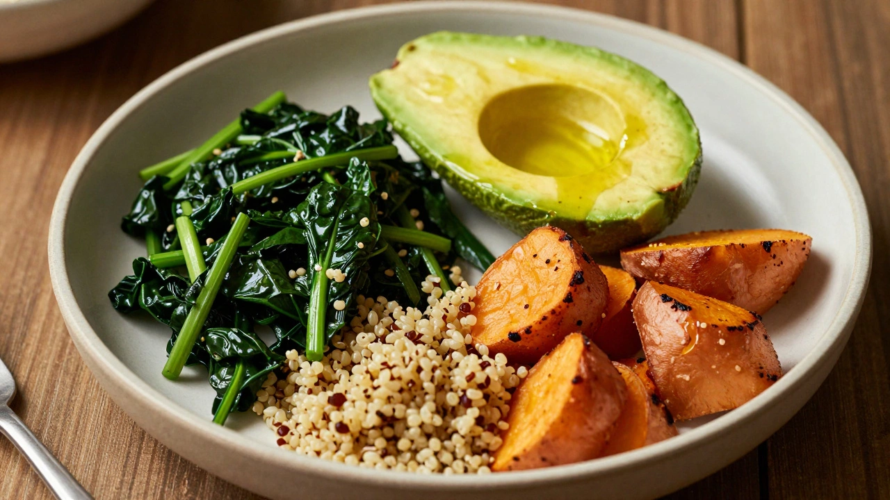 Balanced plate with greens, quinoa, avocado, and sweet potato